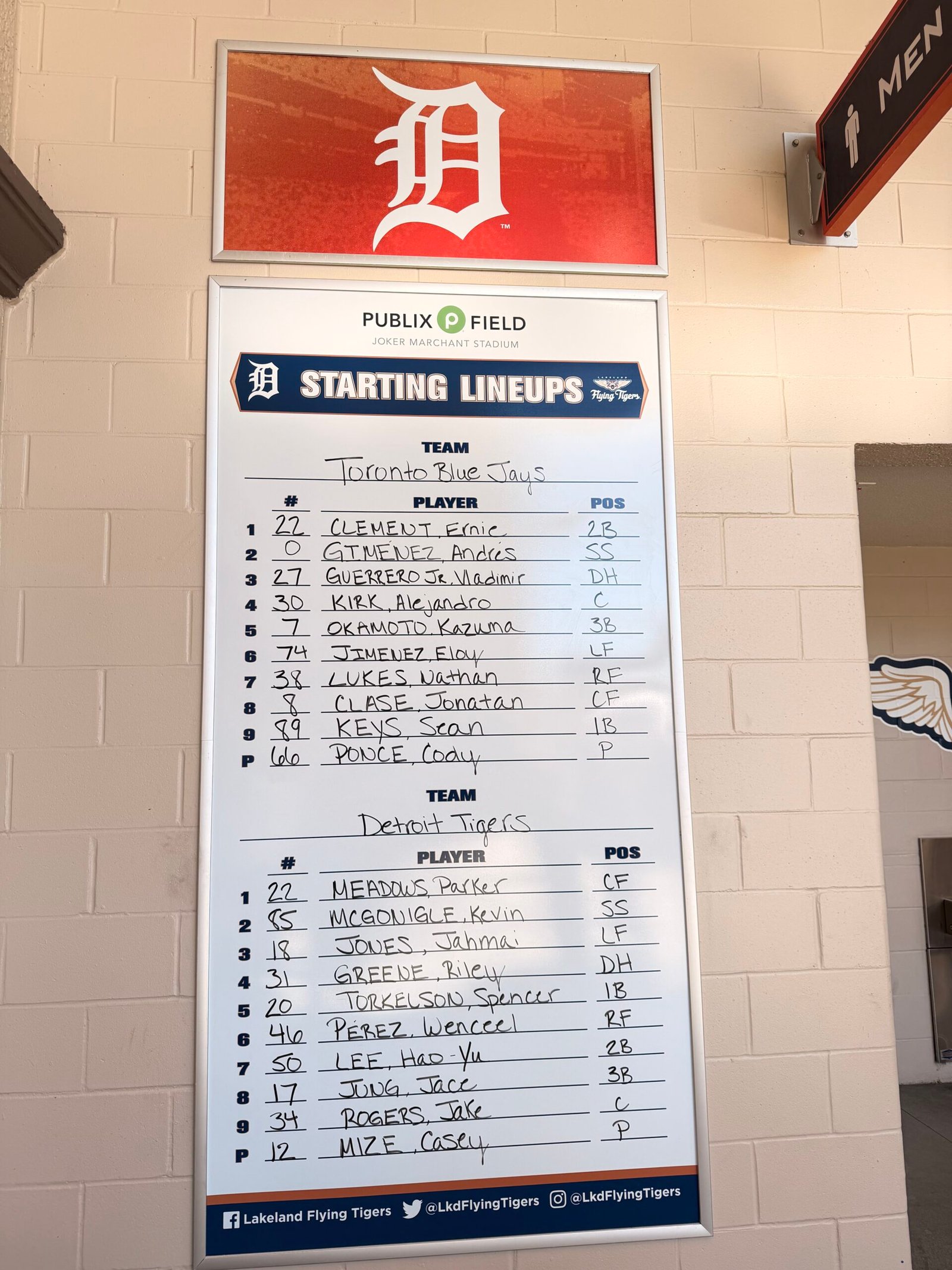 Starting lineups whiteboard showing Toronto Blue Jays vs Detroit Tigers at Publix Field Feb 25 2026