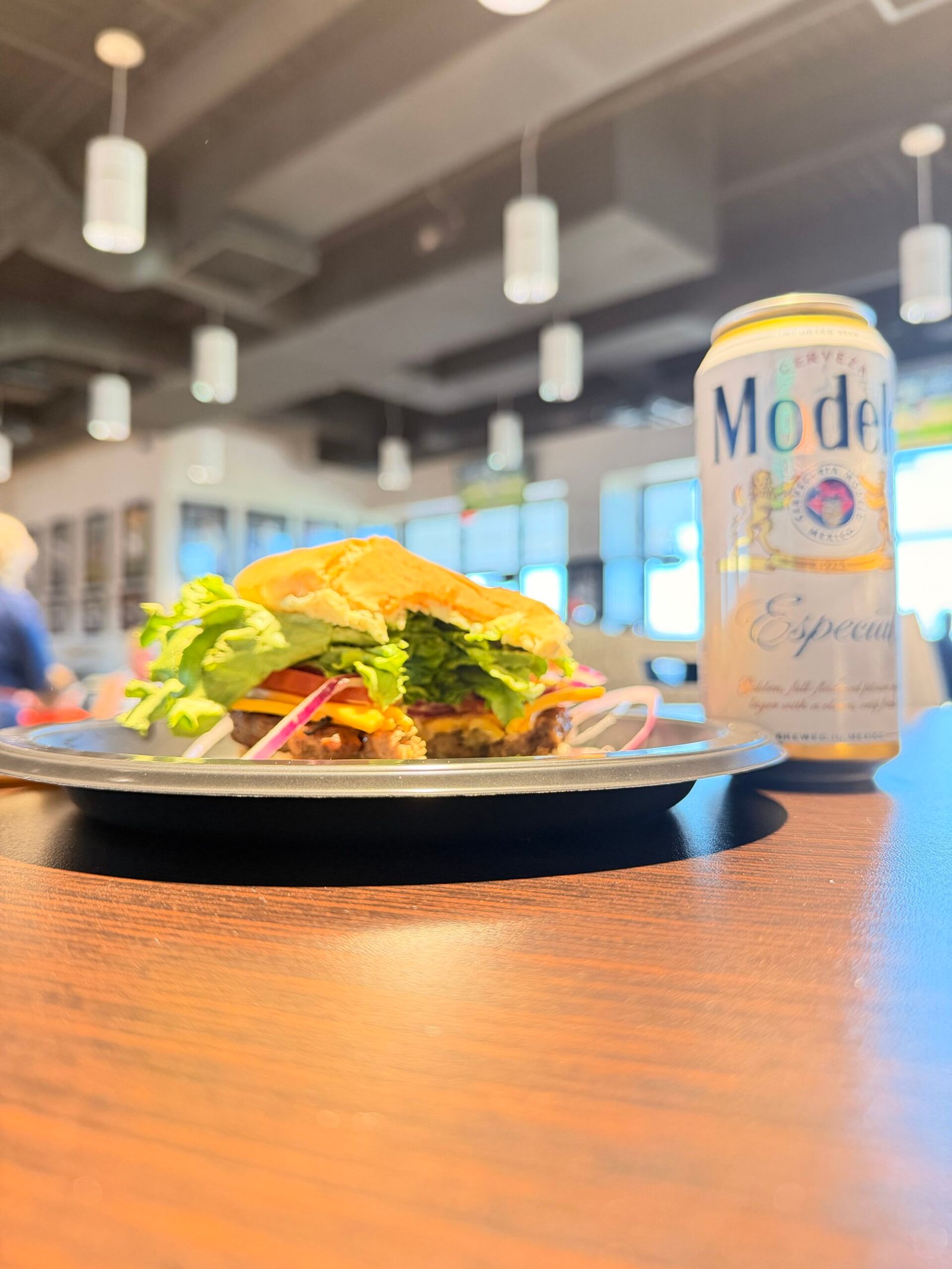 34 Club burger with Modelo Especial beer can at Joker Marchant Stadium