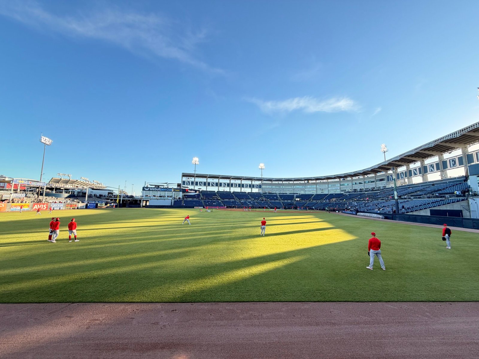 Field-level view of the YANKEES grandstand at golden hour